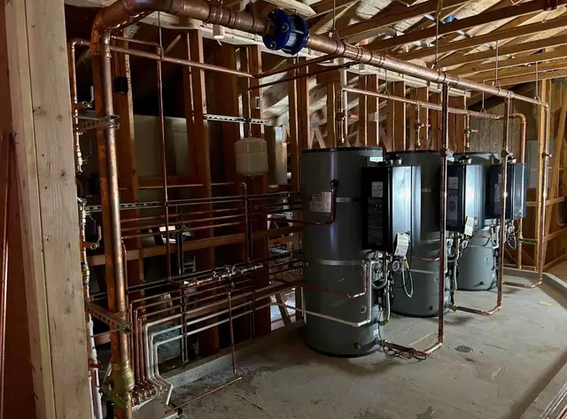 Multiple commercial water heaters with copper pipe runs and expansion tank in Gresham OR – Efficiency Plumbing