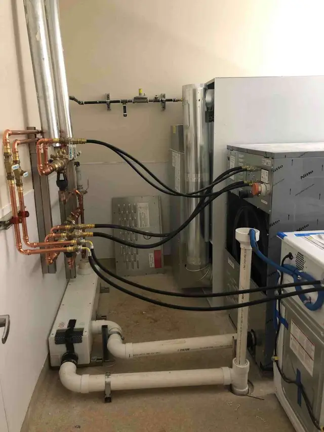 Copper pipe manifold and tankless water heater installation in Sandy OR – Efficiency Plumbing