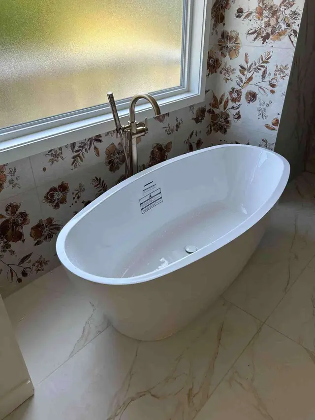 Freestanding soaking tub with wall-mount faucet installation in Welches OR – Efficiency Plumbing